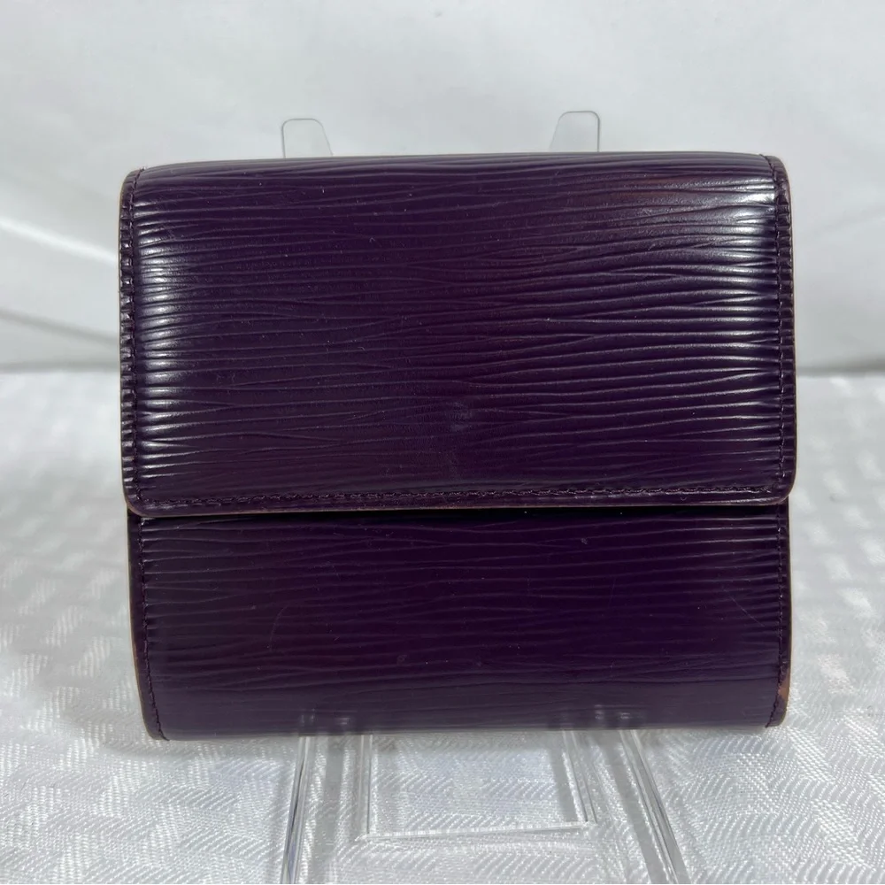 1136: Louis Vuitton Epi Leather Trifold Wallet Purple